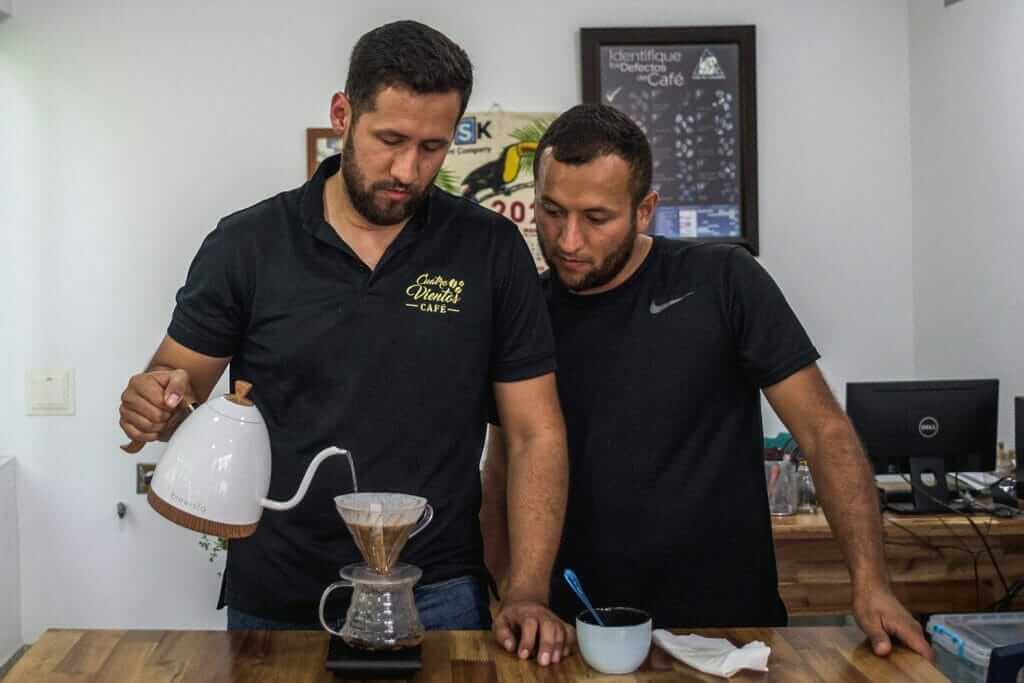 Yonatan and Julian of Cuatro Vientos brewing coffee